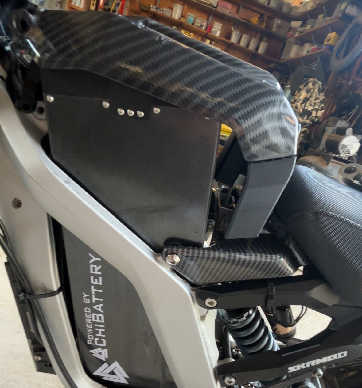 Surron Light Bee X 3d printed 3 inch battery riser for Chi/EBMX battery